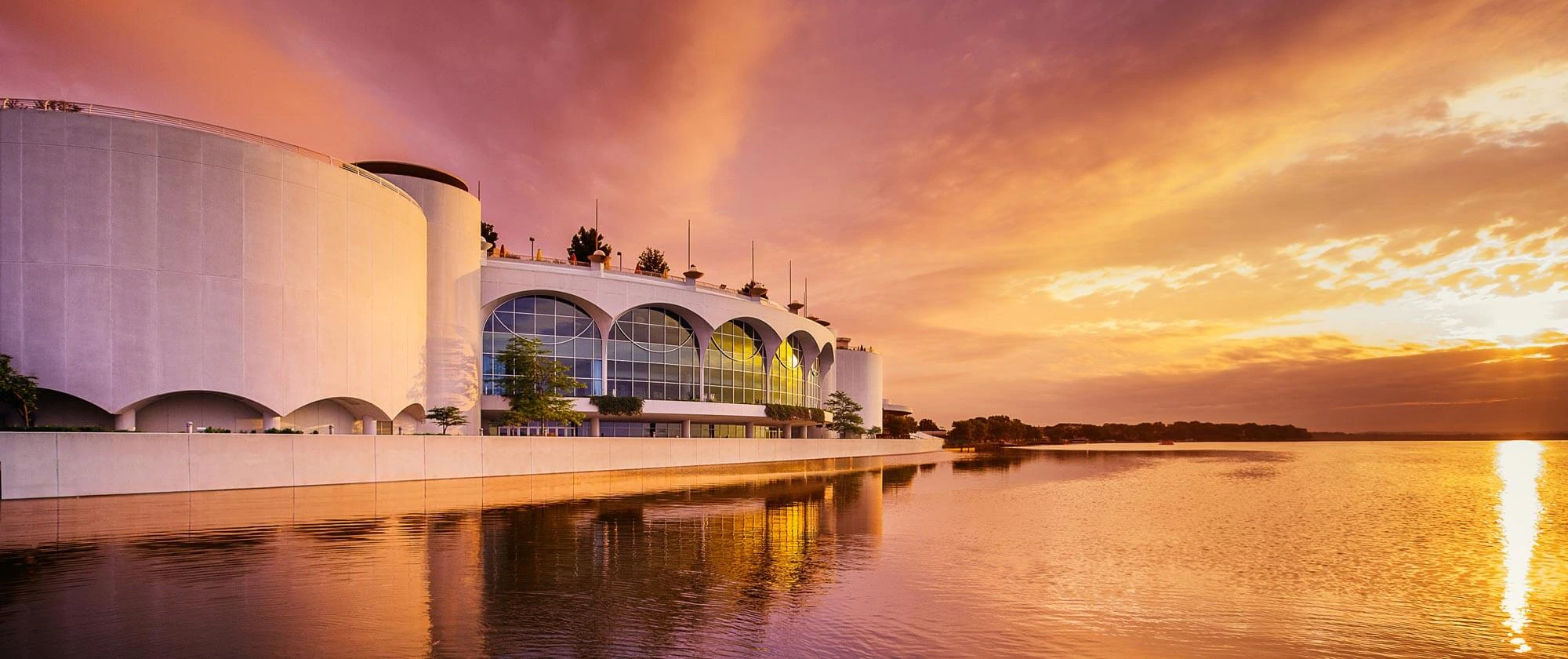 Monona Terrace community and convention center on the Madison waterfront at sunset.